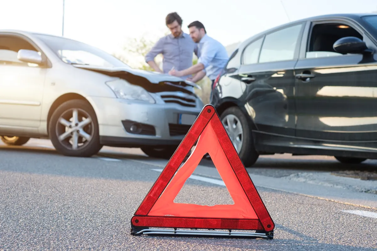 Warning triangle after a two-car crash